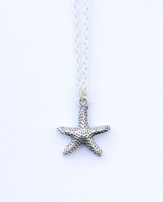 Colgante estrella de mar plata