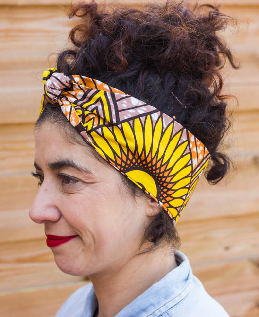 Diadema turbante estilo africano con flor de girasol amarilla - KHAMALI