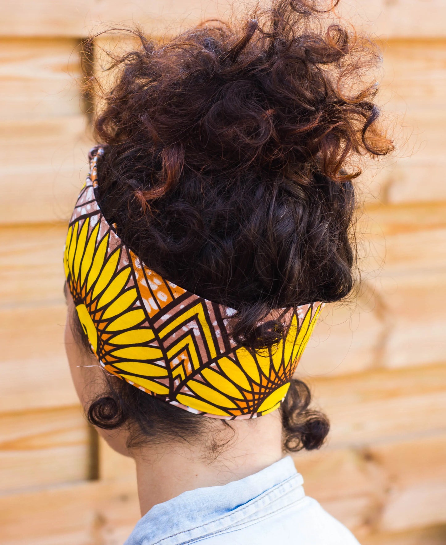 Diadema turbante estilo africano con flor de girasol amarilla - KHAMALI