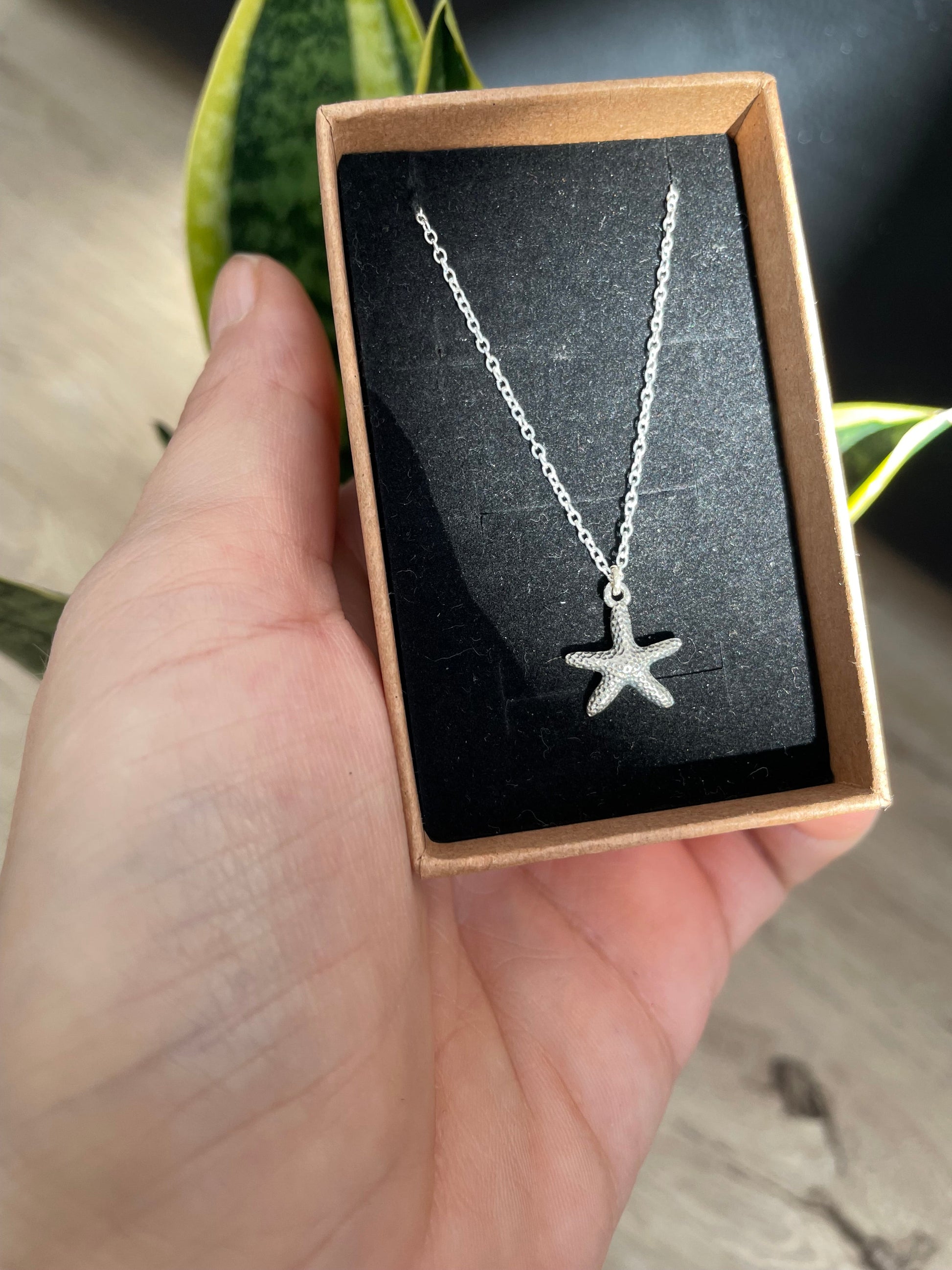 Colgante estrella de mar plata KHAMALI