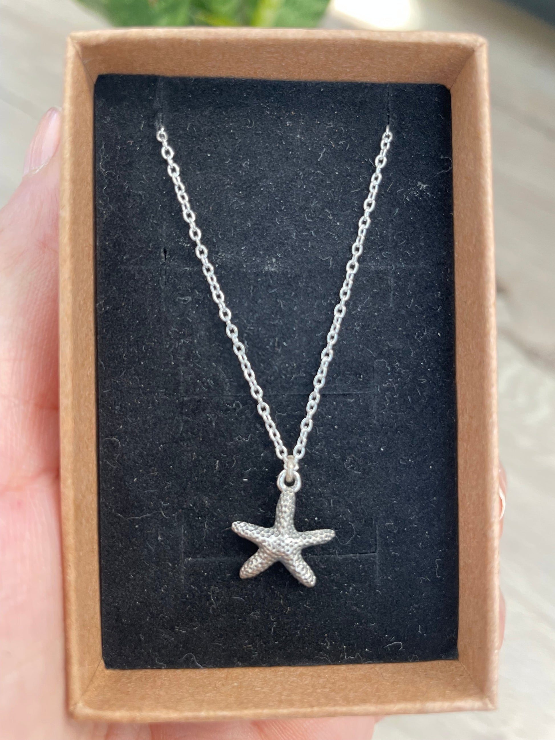 Colgante estrella de mar plata KHAMALI